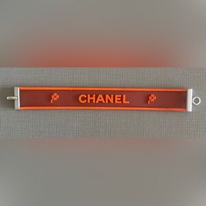 Chanel Vintage Silicone and Palladium Logo  Vibrant Orange